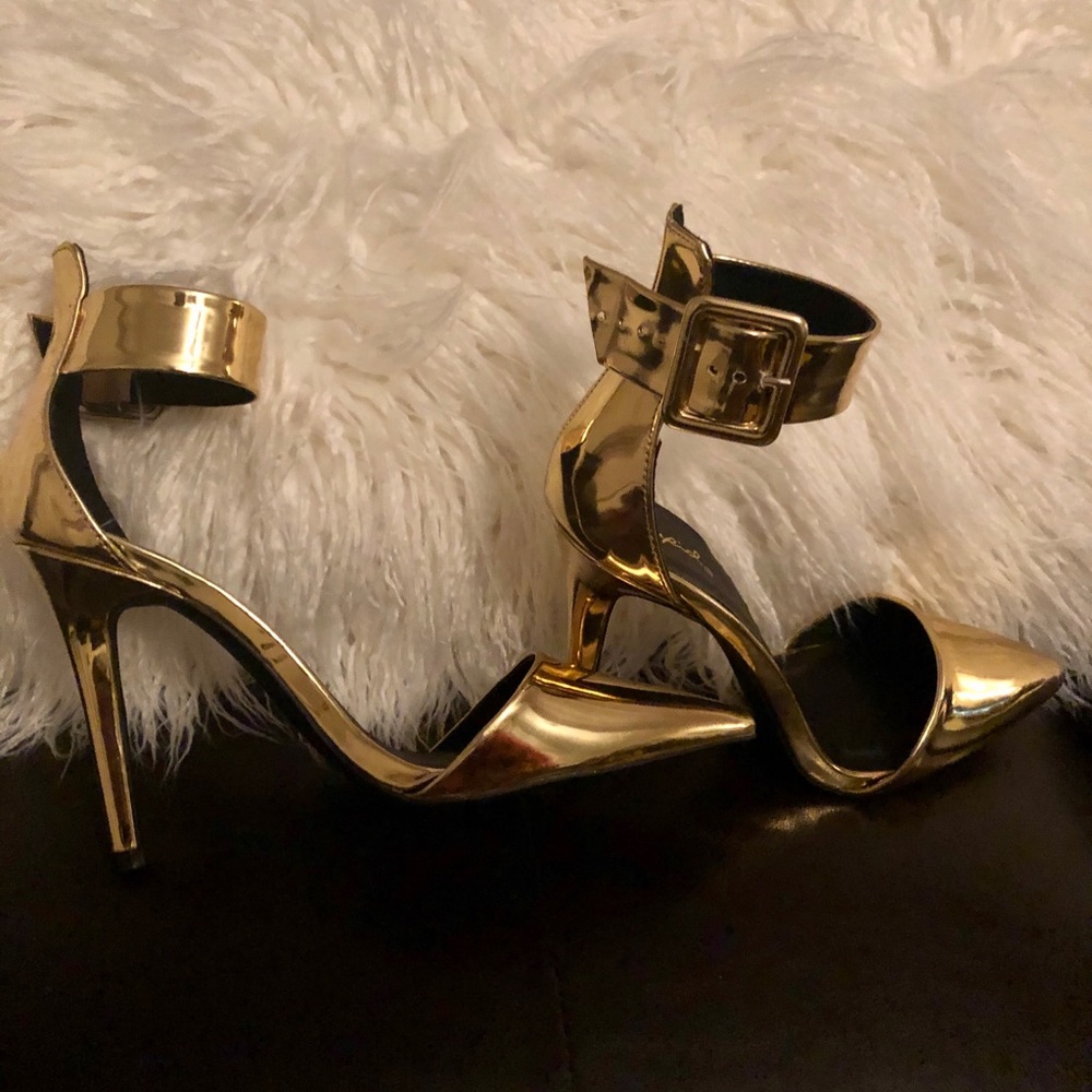Gold metallic pointed toe ankle strap heels